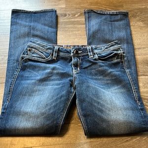 Rock revival blue jeans inseam is 34